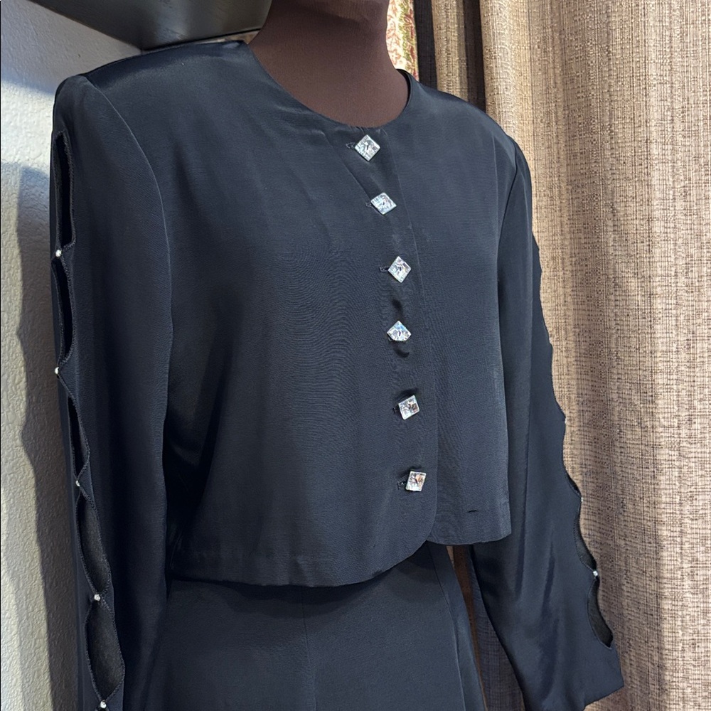 Vintage 1980’s XTRMZ black long split sleeve blouse and mini skirt set. Size S.